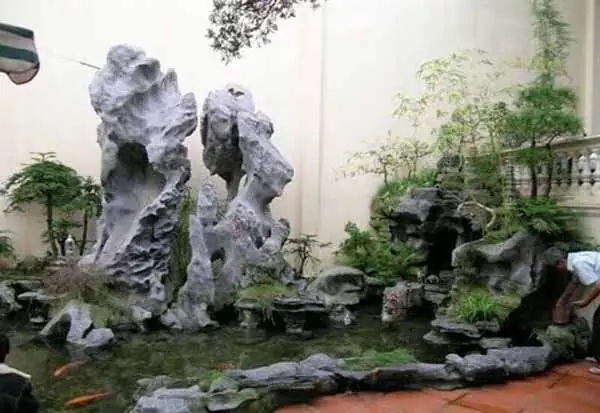 Hướng Dẫn Toàn Diện Về Hòn Non Bộ Nuôi Cá Koi: Từ Thiết Kế Đến Chăm Sóc